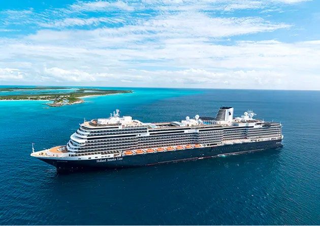 Holland America Line ship near a tropical island