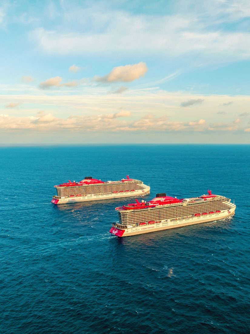 Two Virgin Voyages cruise ships sailing on the open ocean