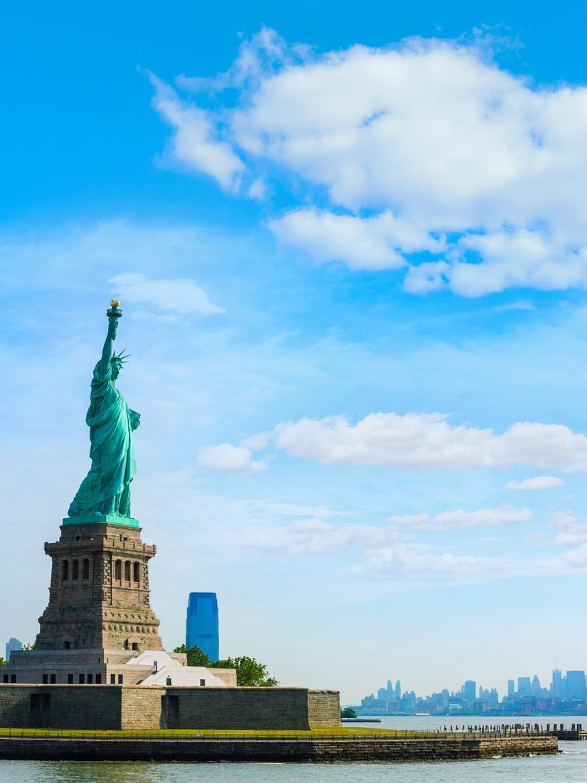 The Statue of Liberty with the New York skyline behind